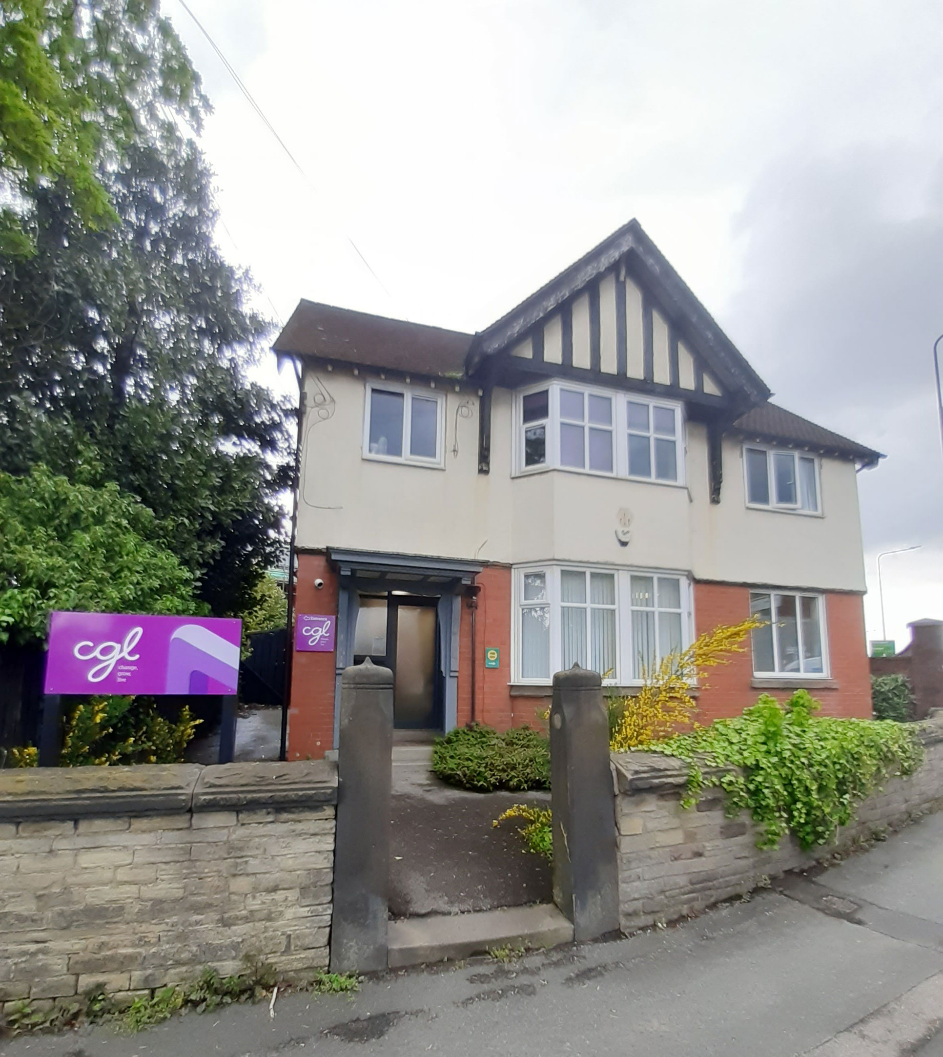 Outside of the Macclesfield Service - a detached mock tudor building
