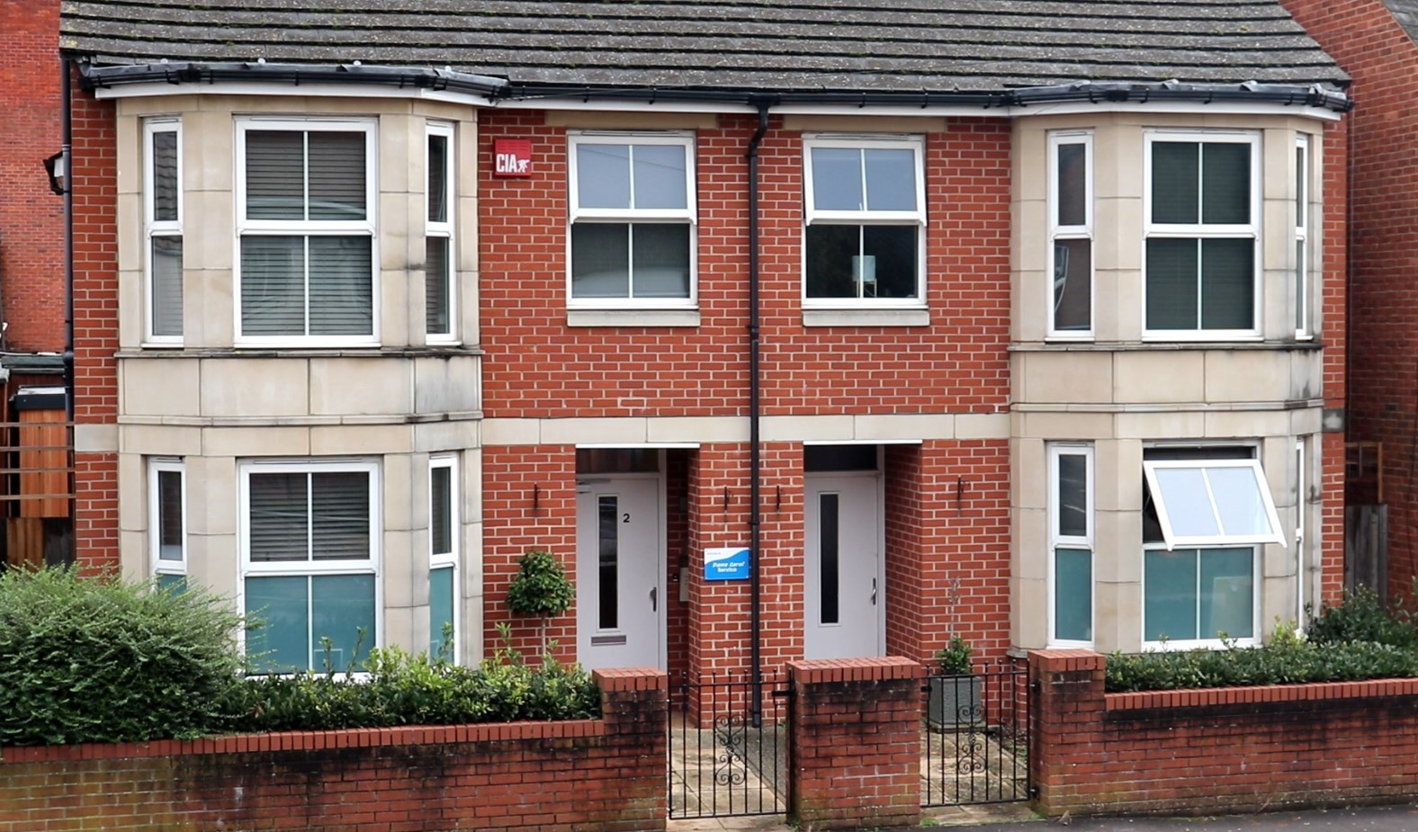 The outside of a red brick building