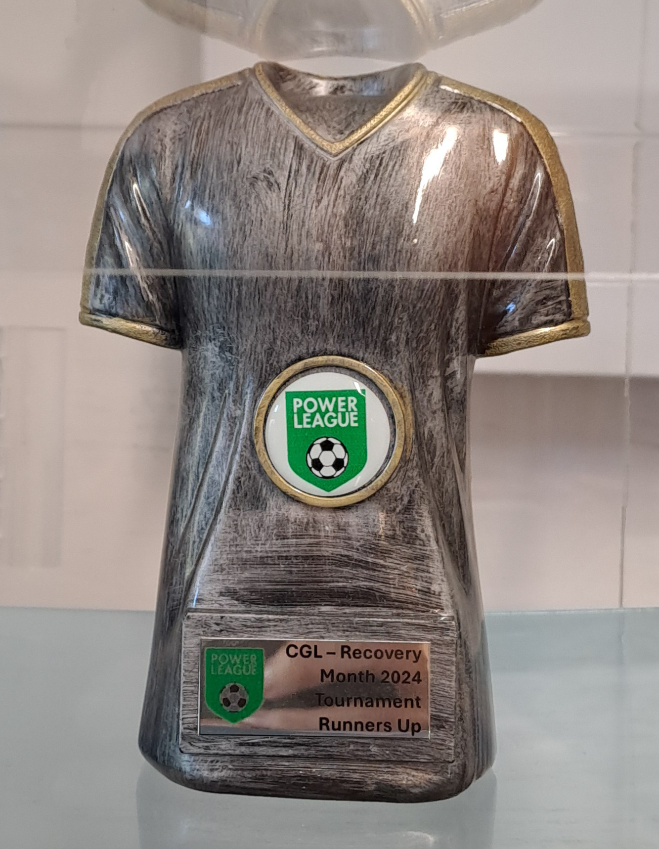 A trophy in the shape of a football shirt