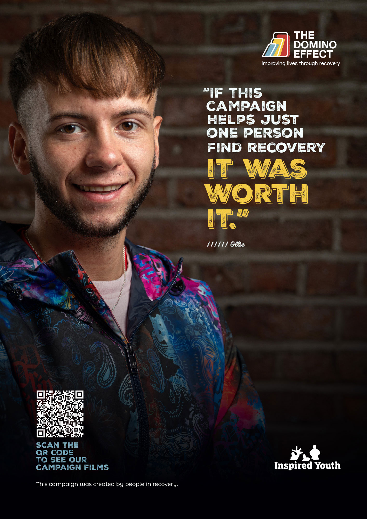 Ollie is wearing a bright patterned jacket with a white t-shirt. The words "If this campaign helps just one person find recovery it was worth it - Ollie" on it 