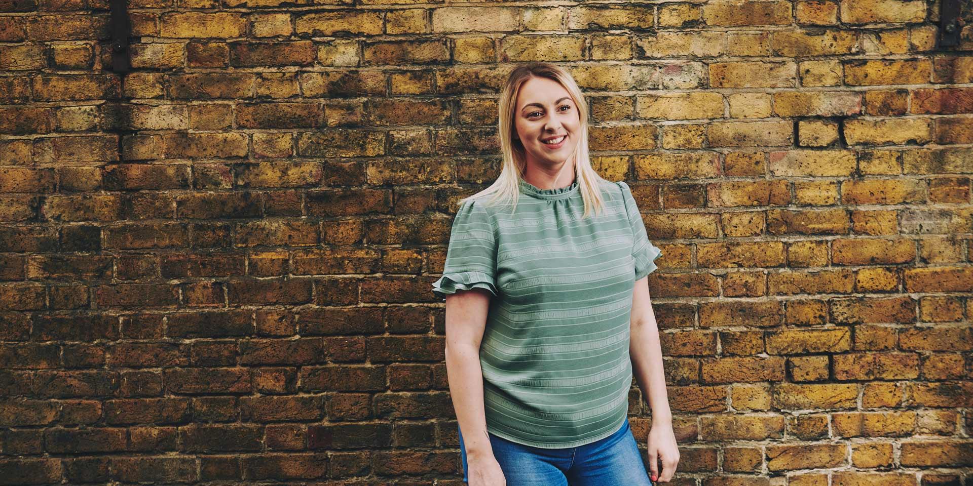 woman smiling looking off into the distance