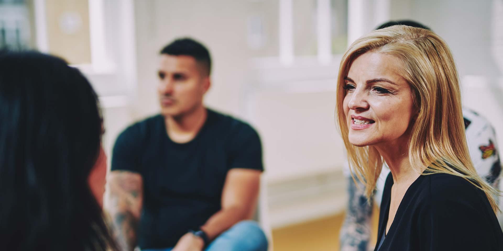 woman talking in a group