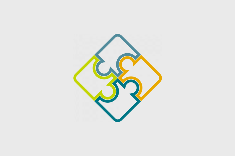 Four puzzle pieces connected together to form a square