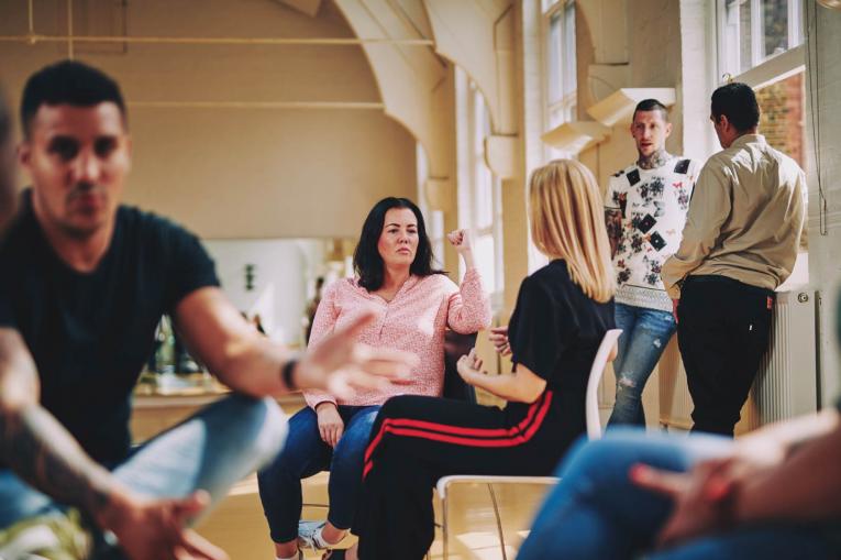 a group of people talking