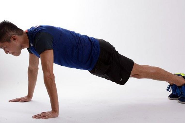 a man doing a press up