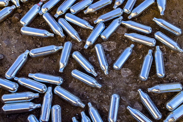 An image of scattered NOS canisters