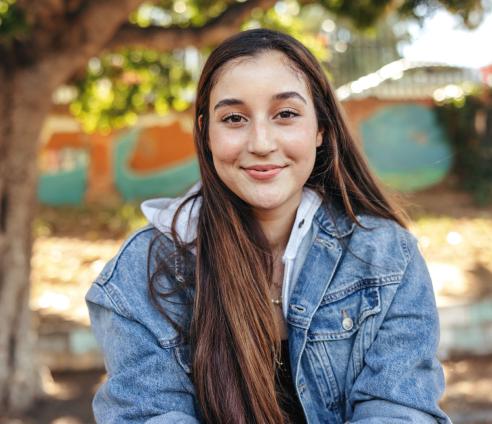 A girl stood in a park