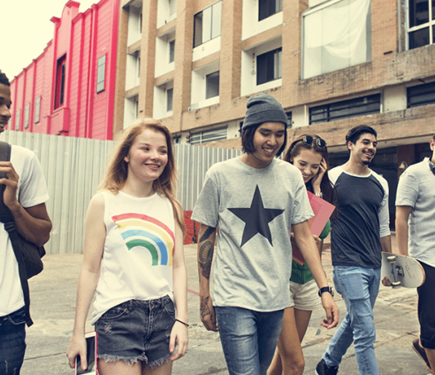 Group of young people walking and talking