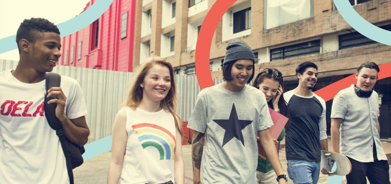 a group of young people walking and smiling