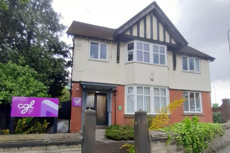 Outside of the Macclesfield Service - a detached mock tudor building 