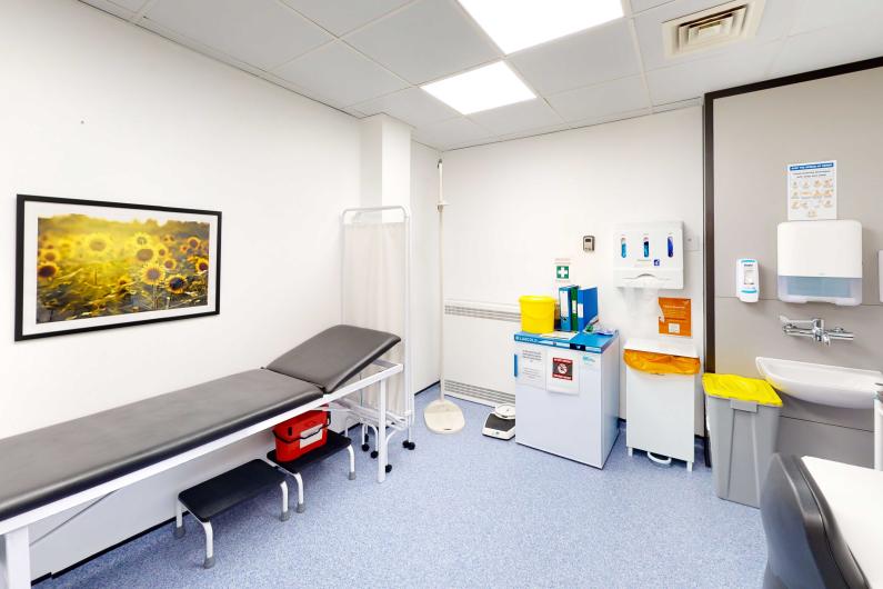 The galleries - a room with a medical bed, desk and medical equipment